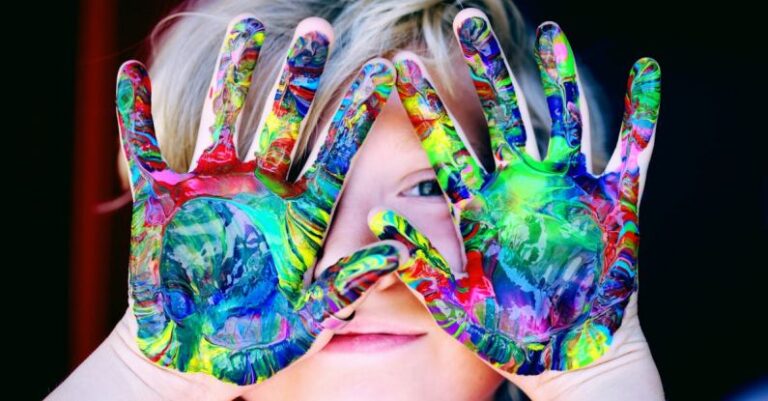 Colors - A KId With Multicolored Hand Paint