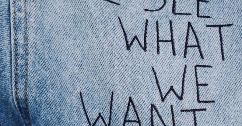 Style - Blue Denim Collared Top With We See What We Want Text Overlay